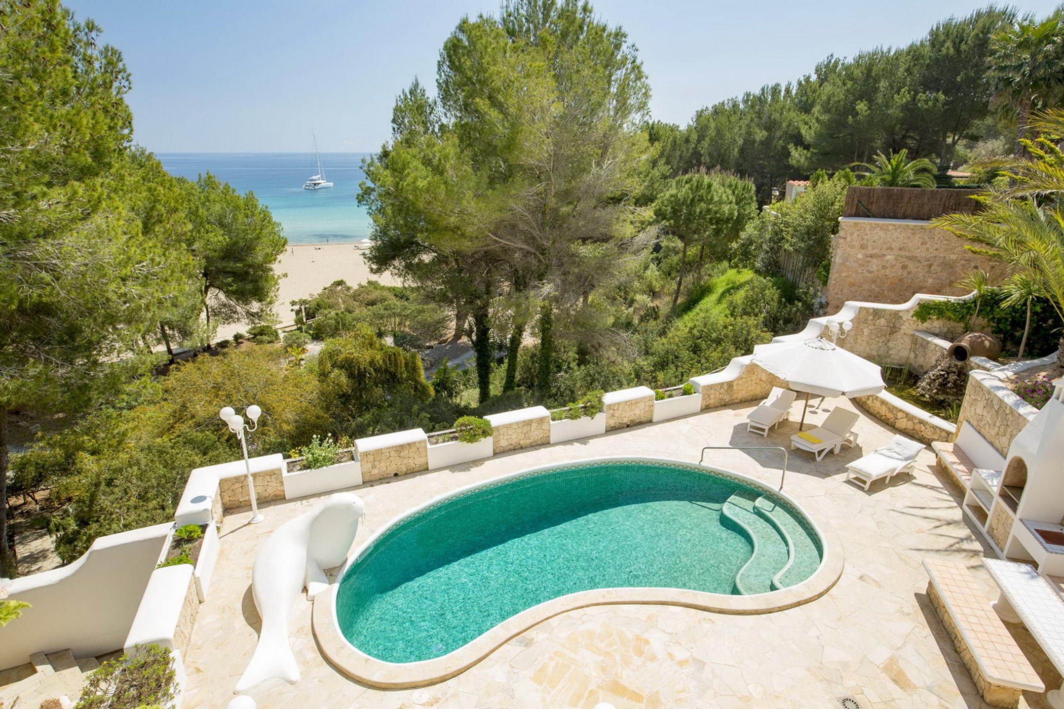 Beach House - Seafront villa with pool at Cala Llenya